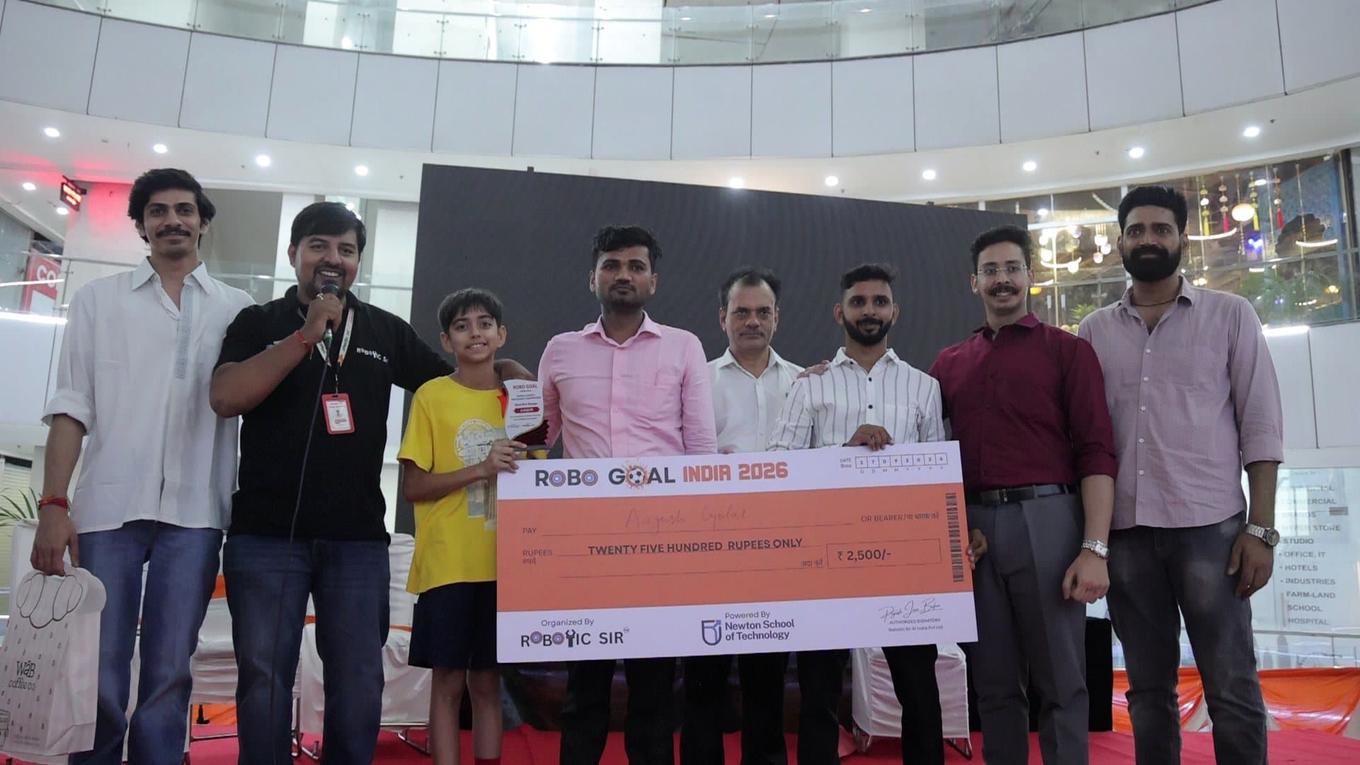 Students competing with self-built soccer robots at Robo Goal India 2026 in Noida photo 7