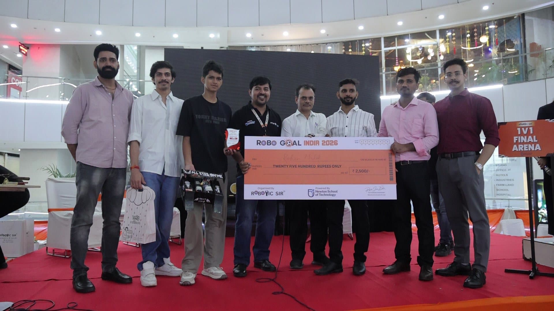 Students competing with self-built soccer robots at Robo Goal India 2026 in Noida photo 8